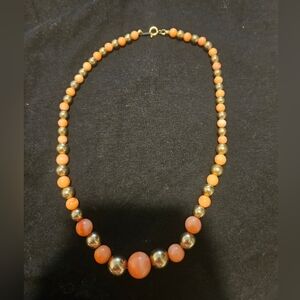 Elegant Coral and Gold Beaded Necklace